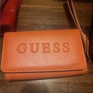 GUESS Orange Wristlet Wallet with Embossed Logo